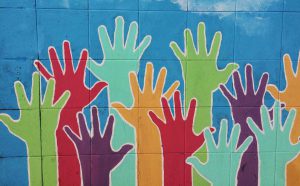 A mural featuring hands